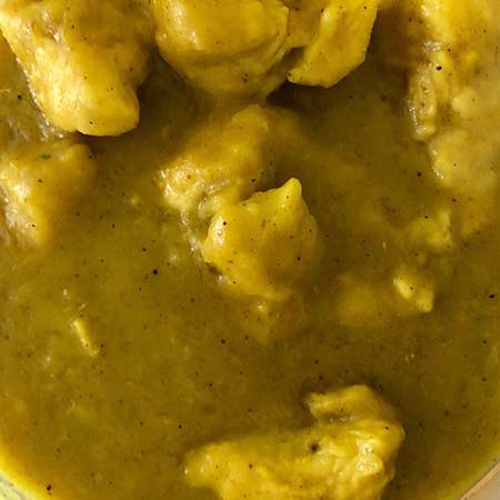 Pollo al curry cremoso