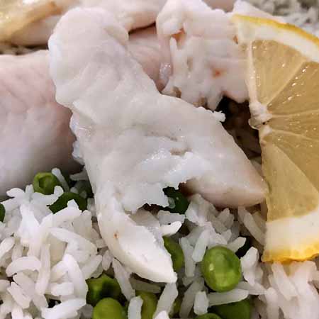 Riso basmati al limone con piselli e merluzzo