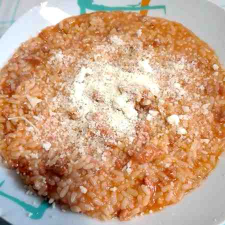 Risotto con pomodoro e salsiccia