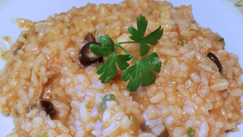 Risotto con preparato di pesce e zucchine